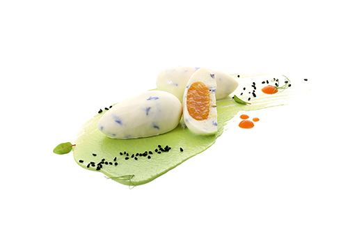 Bergkäse-Aprikosen-Praline würziger Bergkäse mit süß-säuerlichem Aprikosenkern.