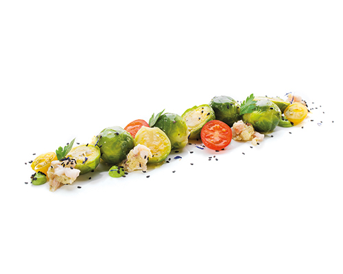 Rosenkohl (extra vorgegart) verfeinert mit Speck und Zwiebeln, abgeschmeckt mit Muskat.