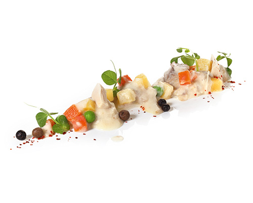 Organic chicken fricassee with turnips, peas and carrots, lightly flavoured.