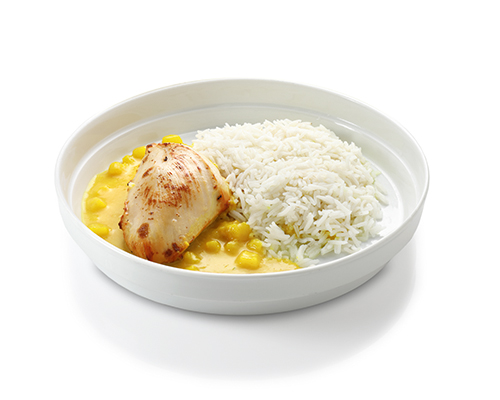 Chicken breast in curry sauce with apples and pineapple, served with basmati rice.
