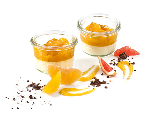 Zabaglione cream with orange-apricot ragout, whipped until light and fluffy, rounded off with port wine, negative for small preserving jar.