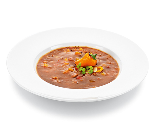 Hungarian-style goulash soup, spicy flavoured, with red pepper cubes, beef and potatoes.