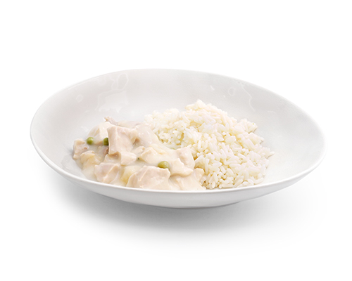 Hühnerfrikassee mit Champignons, Erbsen und Reis.