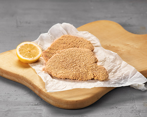 Breaded veal escalope, raw, from the topside.