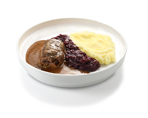 Rinderroulade mit Gemüsefüllung in brauner Sauce, mit Kartoffelpüree und Rotkohl.