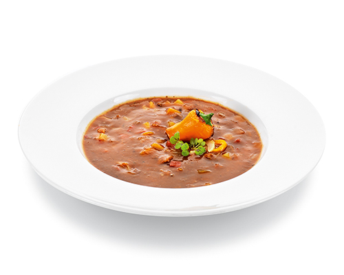 Gulaschsuppe nach ungarischer Art pikant gewürzt, mit roten Paprikawürfeln, Rindfleisch und Kartoffeln.