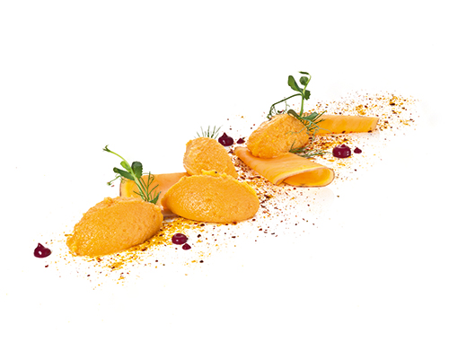 Süßkartoffelpüree abgerundet mit Kokosmilch, Curry und Zimt.