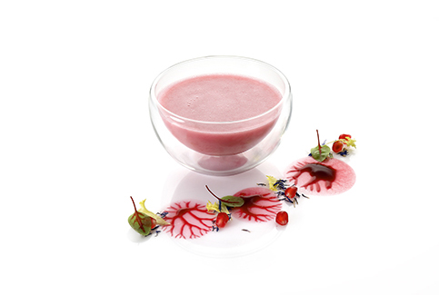 Granatapfel-Dressing auf Essig-Öl-Basis, leichte Säure.