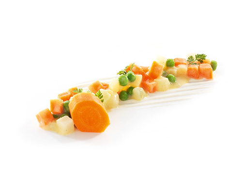 Organic colourful creamed vegetables with carrots, turnips, parsnips and peas.