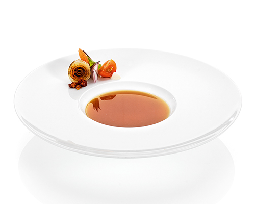 Tomato consommé clarified.