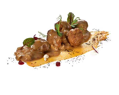 Beef meatballs in cranberry cream sauce.
