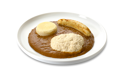 Bratwurst on brown sauce with sauerkraut and mashed potatoes, pureed and enriched with quark and cream.
