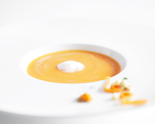 Finely pureed cream of carrot soup, without chunks.
