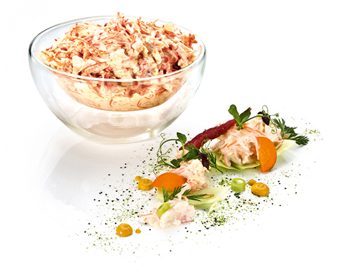 Cole slaw with white cabbage and carrots, in a spicy horseradish and sour cream dressing.