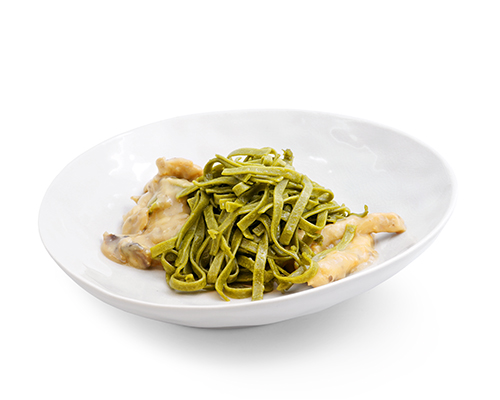 Creamy pork strips with mushrooms and green ribbon noodles.