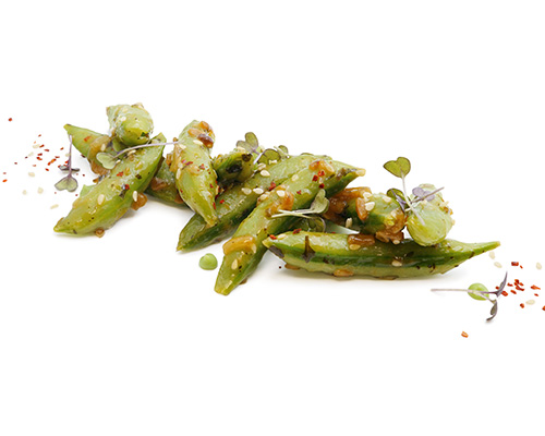 Sugar snaps with sesame and peanut refined with ginger.