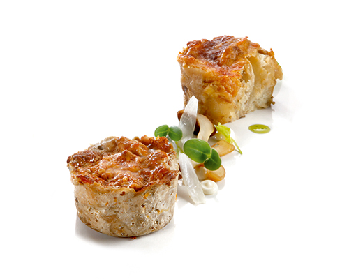 Steinpilz-Kartoffel-Törtchen mit Mozzarella und Gouda gratiniert ø ca. 6 cm.