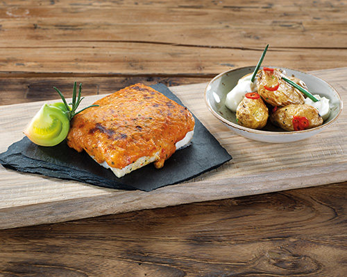 Schlemmerfilet Italiano pollack fillet with tomato and mozzarella topping.