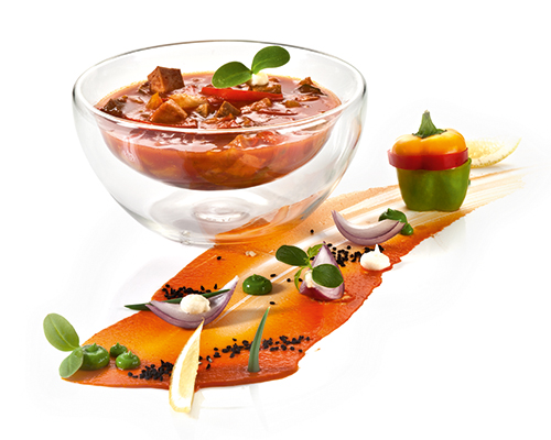 Solyanka classic sweet and sour paprika soup, with hunting sausage, beef, peppers and gherkins.