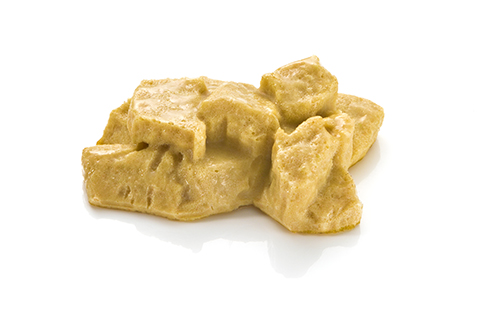 Hühnerfrikassee püriert aus Hühnerfleisch, mit Spargel, Champignons und Erbsen.