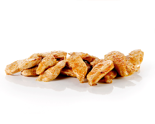 Sliced chicken breast seasoned and fried.