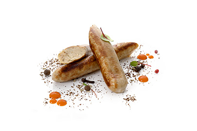 Vegane Bratwurst gebraten, am Stück, auf Weizen- und Erbsenproteinbasis.