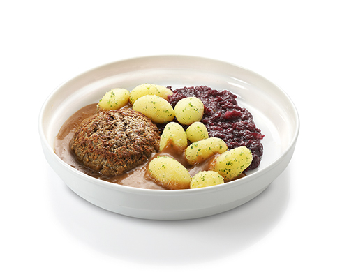 Beef rissole in gravy with red cabbage and parsley potatoes.