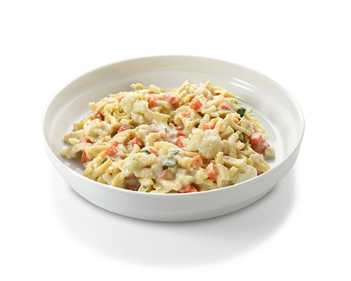 Spaetzle and vegetable pan with cauliflower, courgettes and carrots, in a cream sauce.