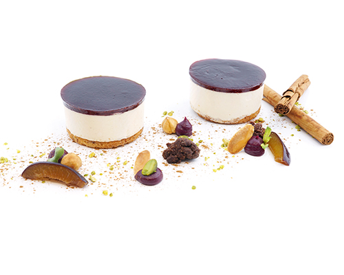 Almond nougat with plum on a nut base Melt-in-the-mouth almond nougat mousse with Dulcey chocolate and fruity plum topping, ø 5 cm.