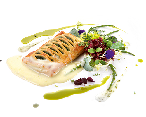 Spinach strudel with pine nuts and shepherd's cheese.