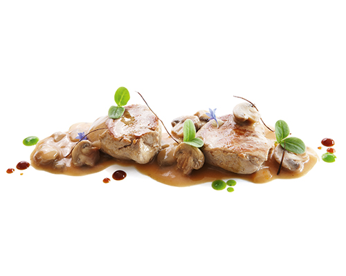 Medaillons vom Schweinefilet in der Pfanne gebraten, in Champignonrahmsauce.