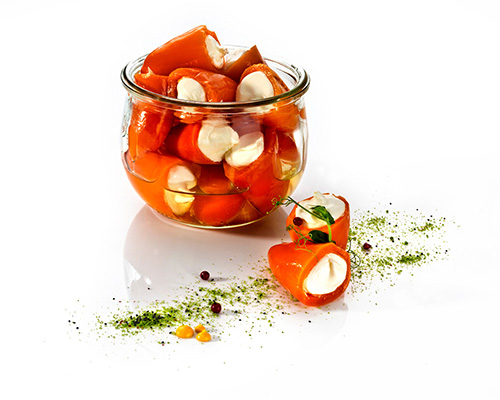 Mini-Paprika "Vitapep" orange Mini-Paprika, mit Frischkäsecreme gefüllt, in Rapsöl.