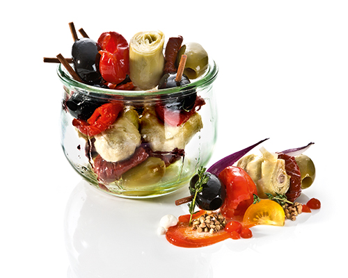 Tuscan-style antipasti skewers with peppadew, green olives, artichokes and sun-dried tomatoes, in rapeseed oil.