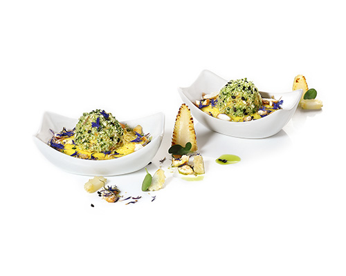 Buckwheat and chickpea praline on corn cream, with bergamot, in a small pan.