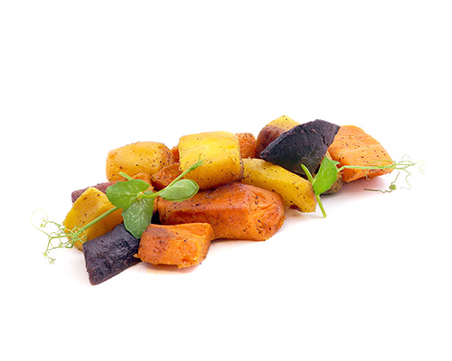 Vegane chunky Vanillekarotten sautierte Karottenstücke mit Vanille aromatisiert.