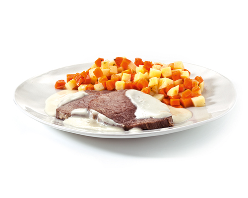 Roast beef in horseradish sauce, with a spicy bouillon potato and carrot mixture.