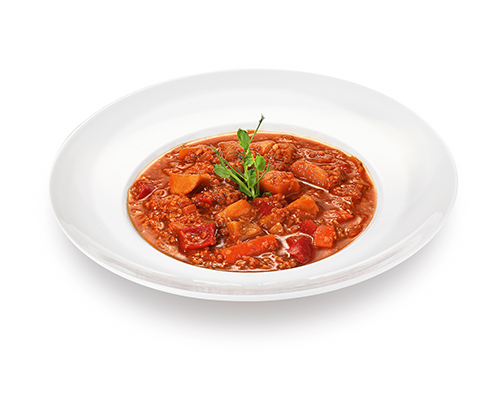 Veganer Bauerntopf Fleischersatz auf Soja- und Erbsenproteinbasis, mit Kartoffeln, Paprika und Karotten.