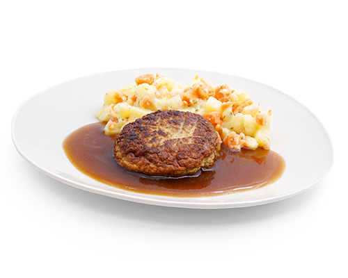 Putenhacksteak in pikanter Sauce, mit Karotten-Kartoffel-Gemüse.