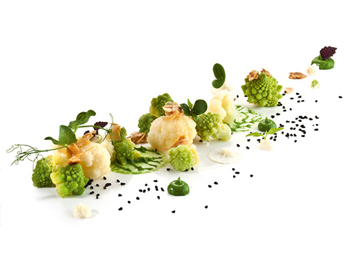 Cauliflower and romanesco vegetables refined with almond butter.