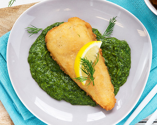 Rahmspinat ohne Zwiebeln, mit frischer Sahne, leicht abgebunden.