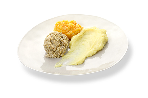 Coarsely chopped sausage with carrots in cream and mashed potatoes, with chunks.