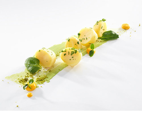 Parisienne Kartoffeln, gekocht.