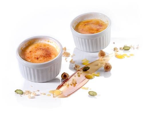 Classic crème brûlée in a soufflé dish.