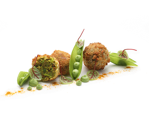 Vegan Pea Balls Pea balls refined with curry, in panko breading.