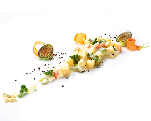 Potato and leek vegetables refined with processed cheese.