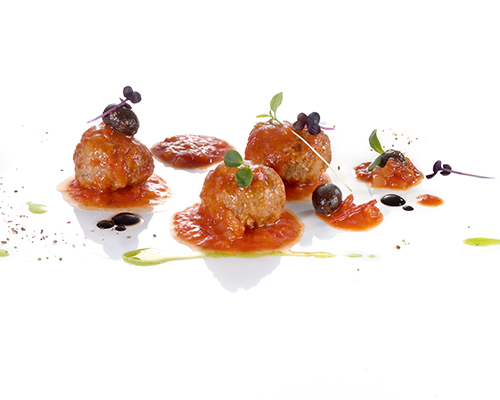 California Meatballs Pork and beef meatballs, in tomato-passion fruit sauce, mildly flavoured.