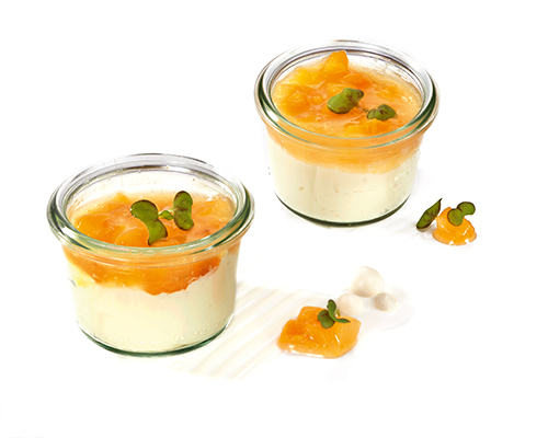 Delicious cream with apricots made from creamy ricotta, negative for small jar.