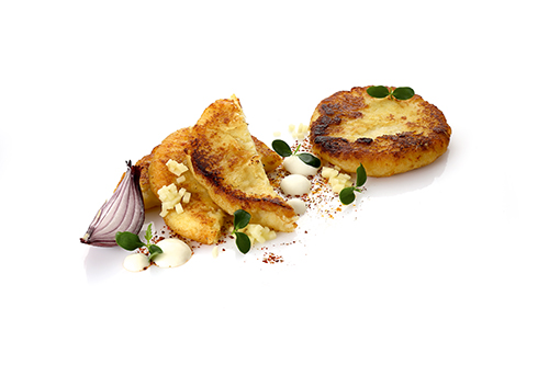 Upieczone wegańskie placki ziemniaczane, złotobrązowe, ø ok. 10 cm.