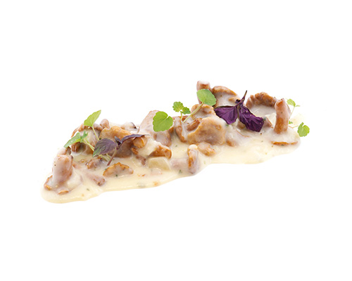 Pfifferlinge à la Crème in herzhafter Rahmsauce mit Zwiebeln.
