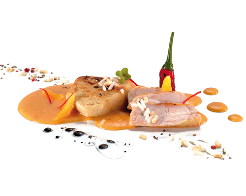 Putenmedaillons in der Pfanne gebraten, in fruchtiger Aprikosen-Chili-Sauce.